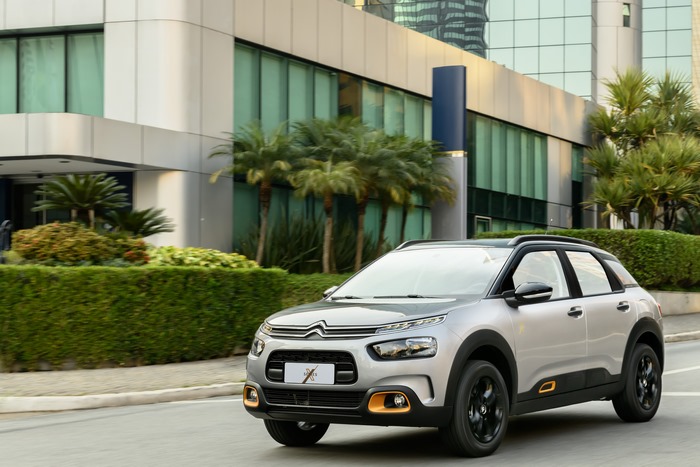 Silver Citroën C4 Cactus X-Series SUV driving
