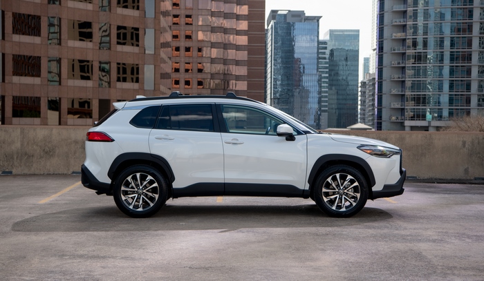 White Toyota Corolla Cross XLE SUV in city