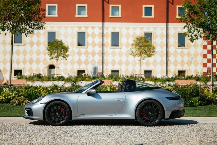 Silver Porsche 911 Targa 4 GTS in front of building