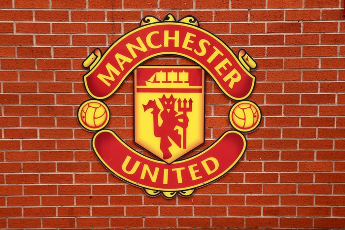 Manchester United F.C. Logo on Brick Wall