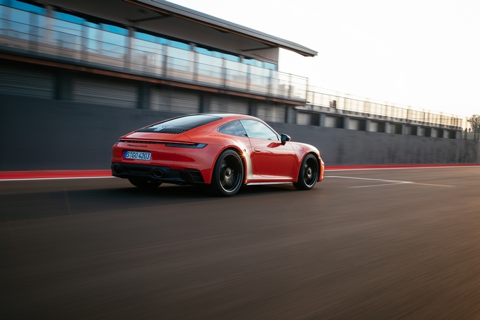 Porsche 911 Carrera GTS speeding on race track