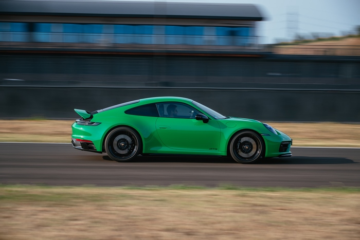 Vibrant Green Porsche 911 Carrera GTS on Track