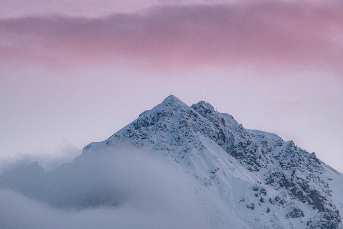 Snowy Mountain Peaks with Pink Sky