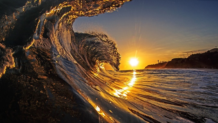 Golden Ocean Wave at Sunset