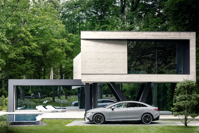 Mercedes-Benz EQE 350 AMG Line at a modern luxury house