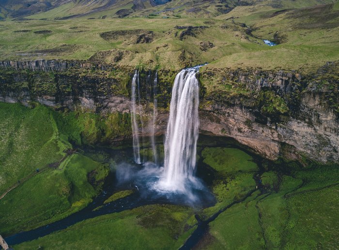 Aerial view of Seljalandsfoss Waterfall and green landscape