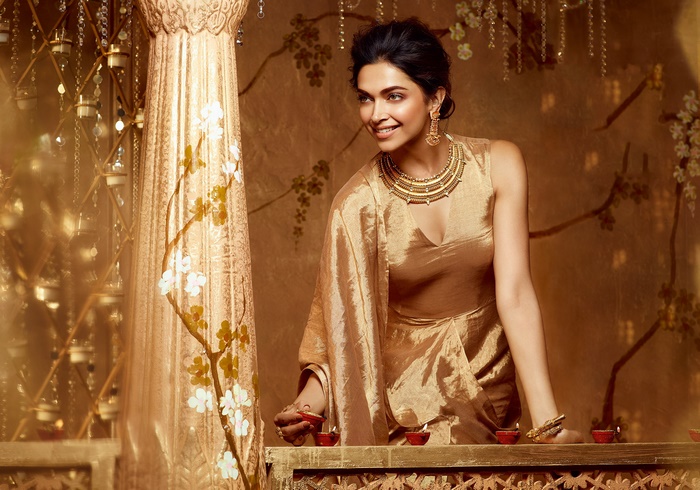 Deepika Padukone in Golden Festive Attire with Diyas