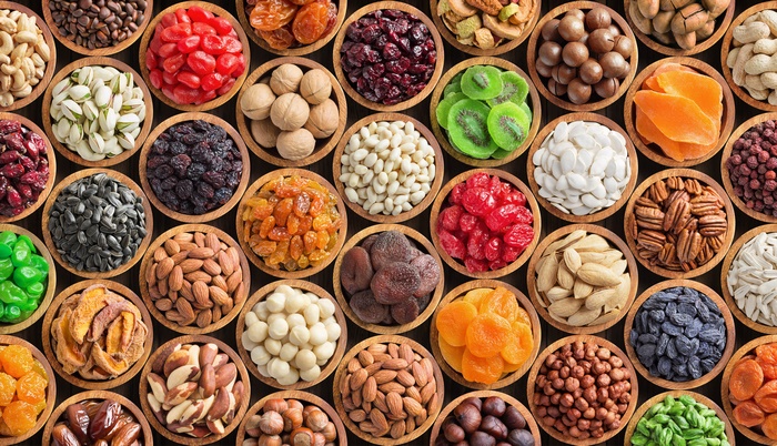 Bowls of Assorted Nuts and Dried Fruits Still Life