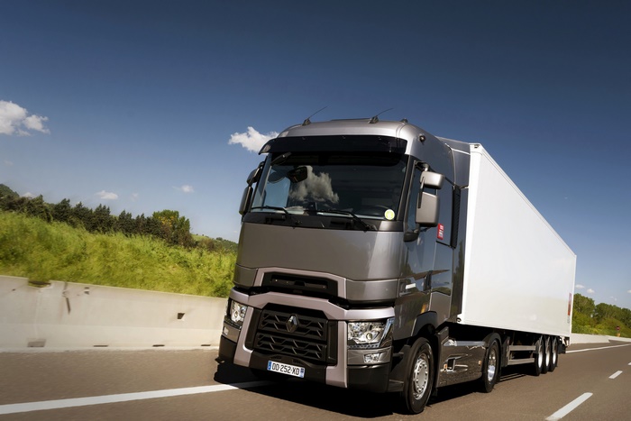 Renault HD truck with white trailer on a highway