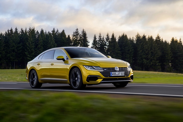 Yellow Volkswagen Arteon R-Line 4K on road