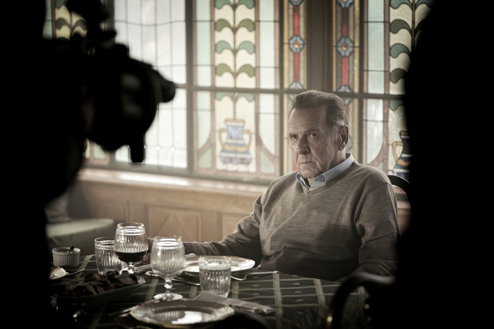 Tom Wilkinson looking serious in SAS: Red Notice