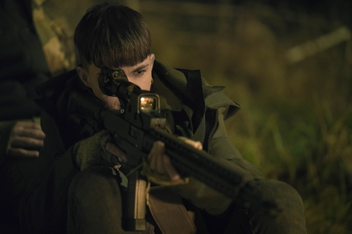 Ruby Rose aiming a rifle in SAS: Red Notice