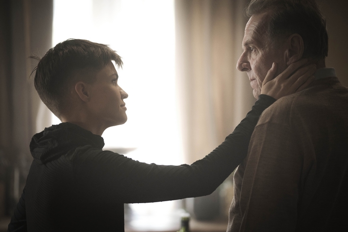 Ruby Rose touches Tom Wilkinson's face in SAS: Red Notice