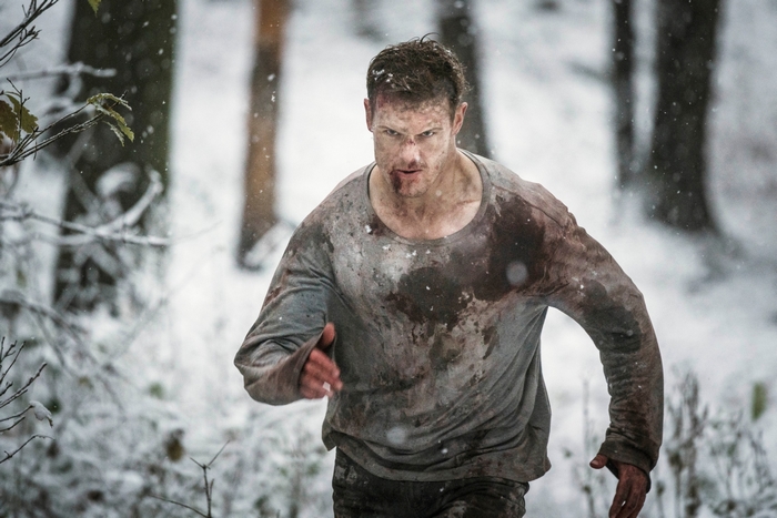 Sam Heughan running in snow from SAS: Red Notice