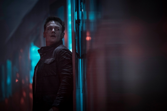 Sam Heughan looking alert in SAS: Red Notice
