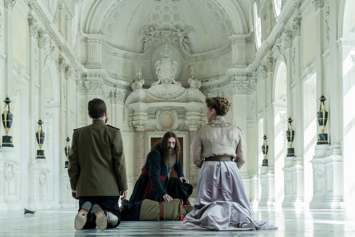 The Kings Man: Rhys Ifans in a grand white hall