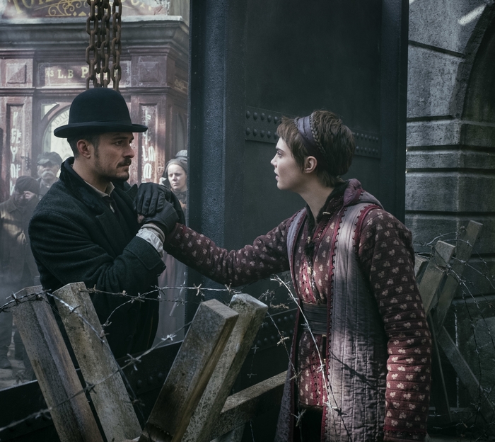 Carnival Row: Philo and Vignette reaching across barriers
