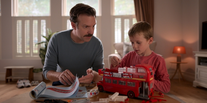 Ted Lasso and son building a London bus