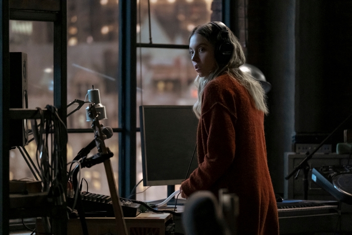 Sydney Sweeney in The Voyeurs with headphones