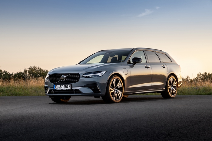 Volvo V90 Recharge luxury car at sunset