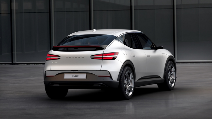 White Genesis GV60 SUV rear view