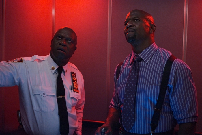 Brooklyn Nine-Nine: Andre Braugher and Terry Crews looking up