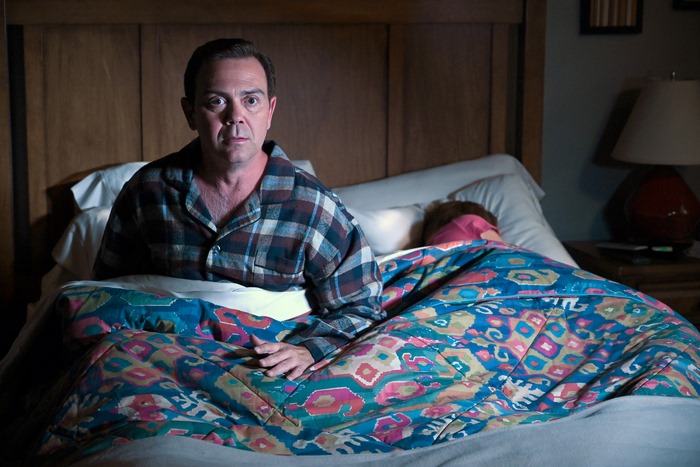 Joe Lo Truglio looking worried in bed, Brooklyn Nine-Nine