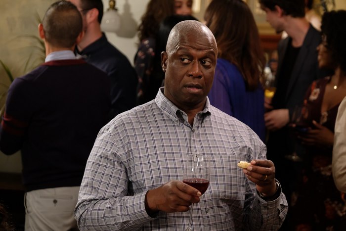 Andre Braugher as Captain Holt at a party