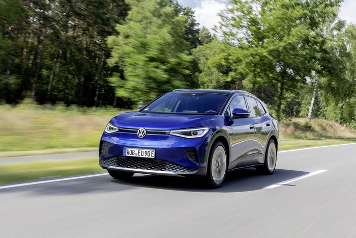 Blue Volkswagen ID.4 Pro Electric Car driving on road
