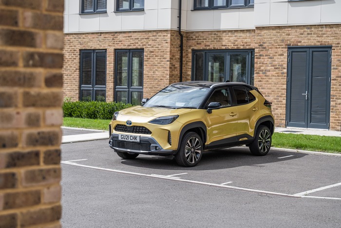 Yellow Toyota Yaris Cross Hybrid SUV 4K