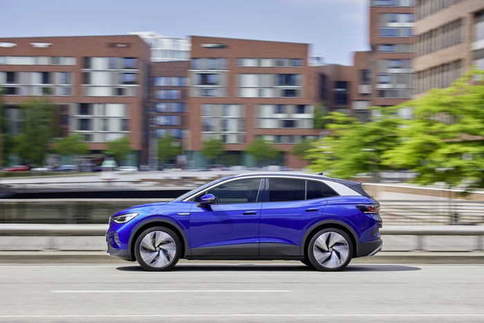 Volkswagen ID.4 Pro electric car driving in city