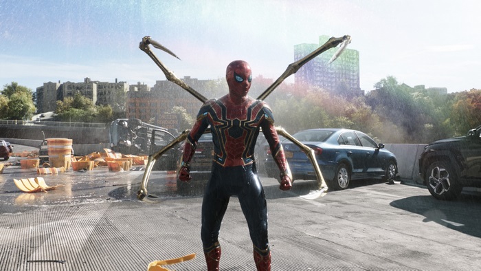 Spider-Man Iron Spider suit on damaged highway
