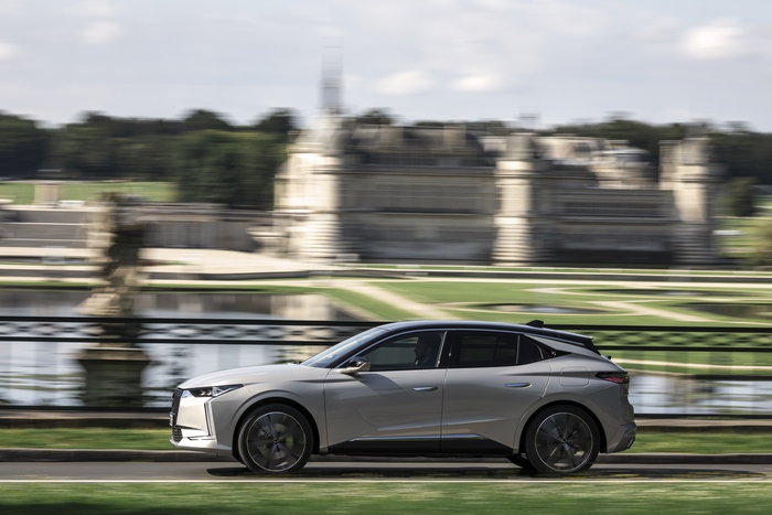 DS 4 E-Tense electric car driving past a palace