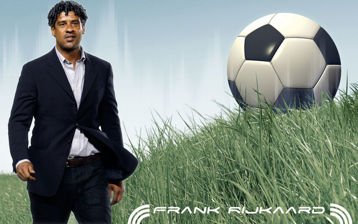 Dutch soccer legend Frank Rijkaard in a grassy field