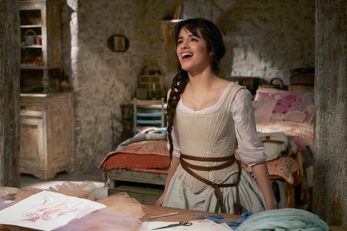 Camila Cabello as Cinderella singing joyfully in her room