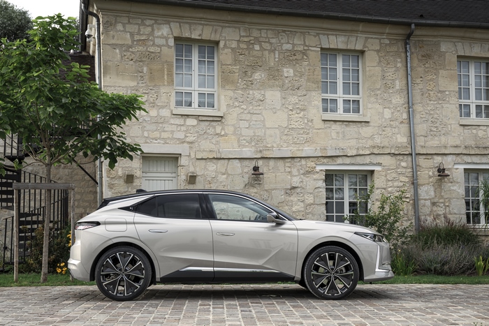 DS 4 E-Tense Electric Car parked at stone house