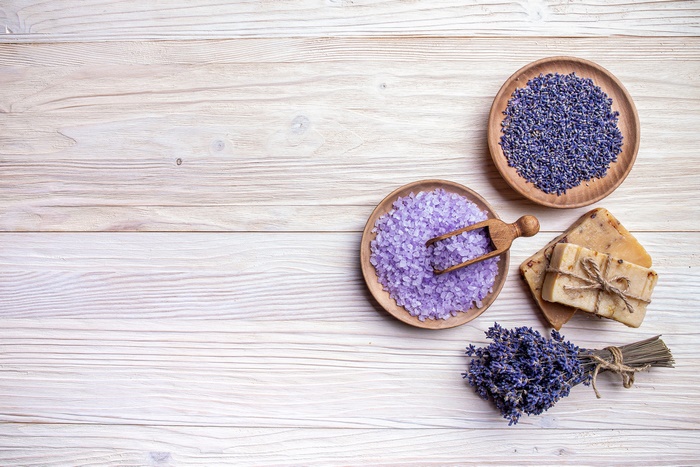 Spa still life with lavender bath salt and natural soap.