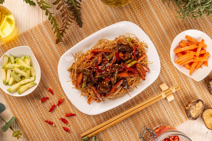 Asian Beef Stir-fried Noodles Meal with Chopsticks
