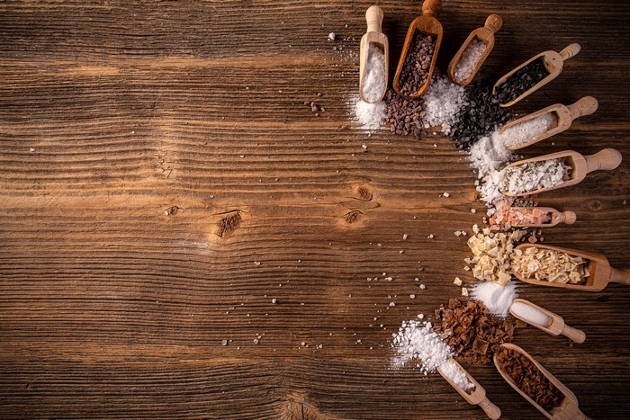 Still Life with Assorted Salts and Spices on Wood