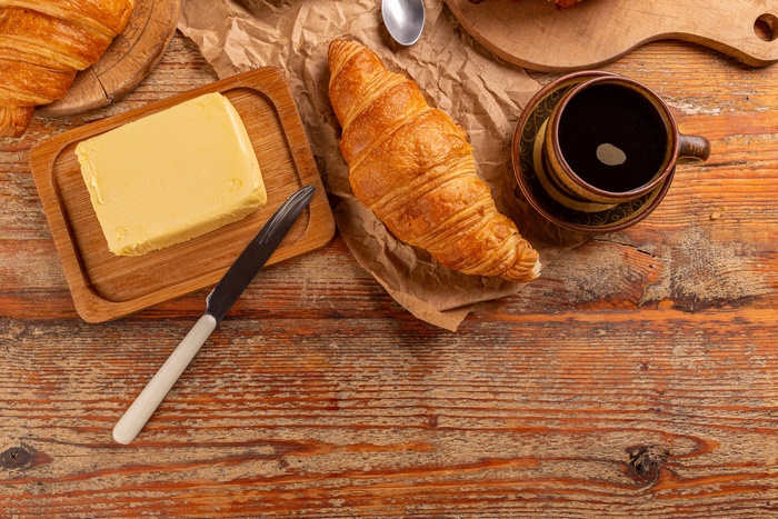 Breakfast with Croissant, Coffee, and Butter