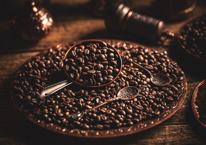Roasted Coffee Beans with Scoop and Spoons