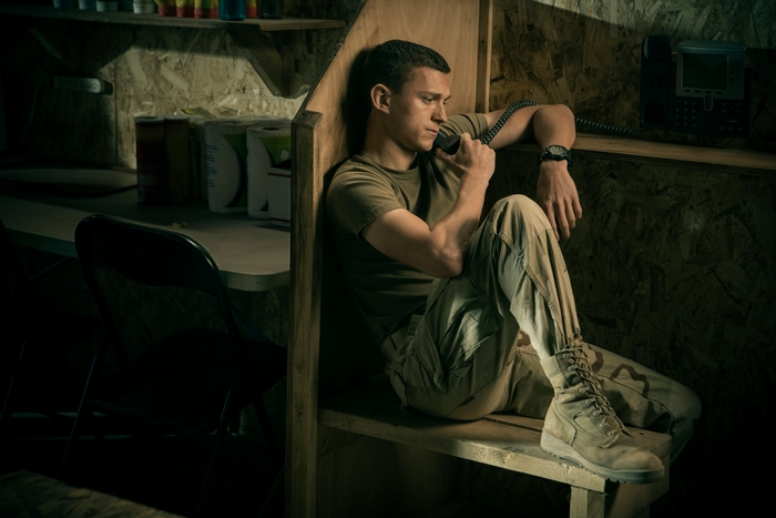 Tom Holland as Cherry making a somber phone call