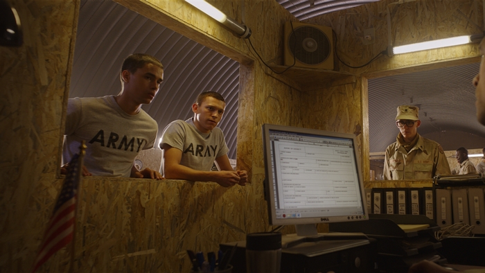 Tom Holland and soldiers in Army barracks from Cherry