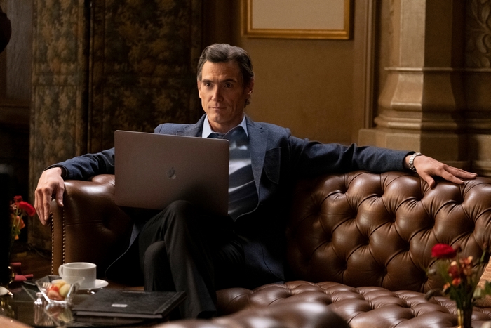 Billy Crudup in The Morning Show sitting with laptop