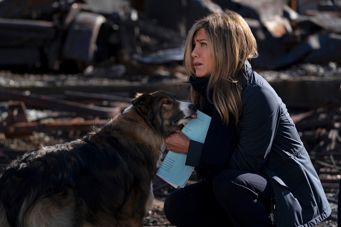 Jennifer Aniston and dog in a somber scene from The Morning Show
