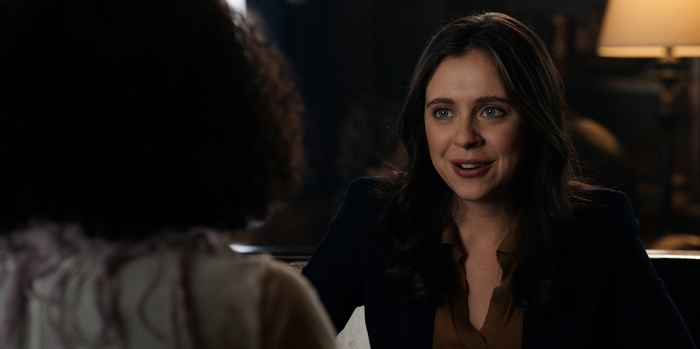 Bel Powley smiling in The Morning Show