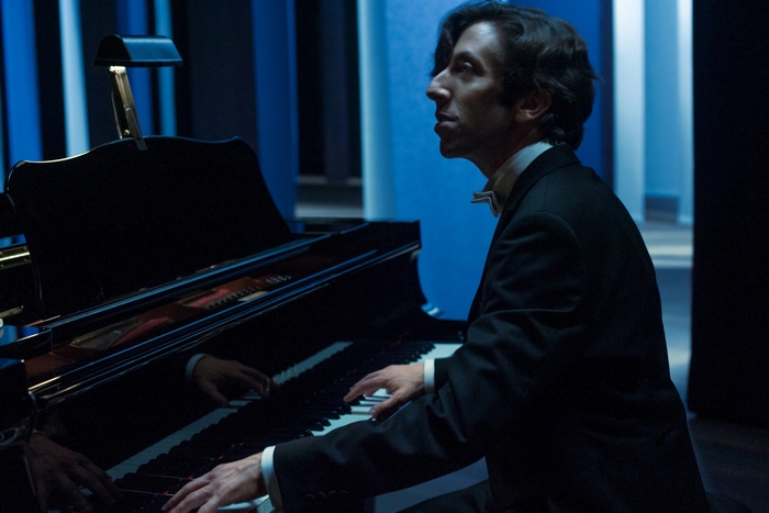 Simon Helberg playing piano in Annette