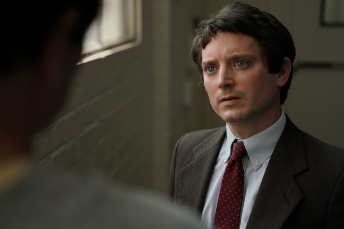 Elijah Wood in No Man Of God, looking intently