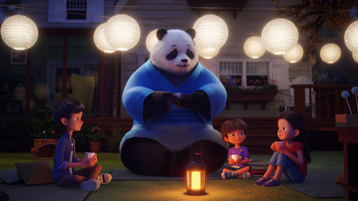 Stillwater and kids enjoying a cozy lantern-lit evening