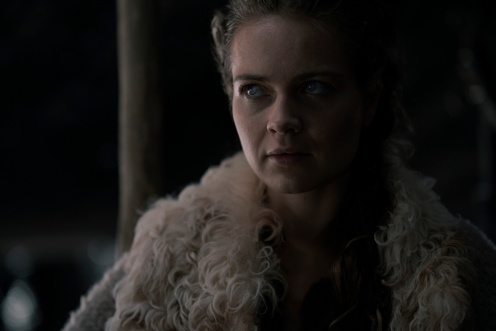 Hera Hilmar in a fur-collared coat